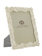Cornice portafoto in resina, 26x2x30,7 cm – Leaf Cream