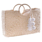 Borsa rettangolare in fibre naturali con manici tondi e nappe, 47x12x32 cm