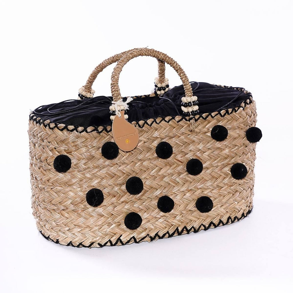 Borsa ovale in erba con pompon neri, 43xH20 cm