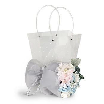 Composizione floreale azzurra con borsa (kit da 3)