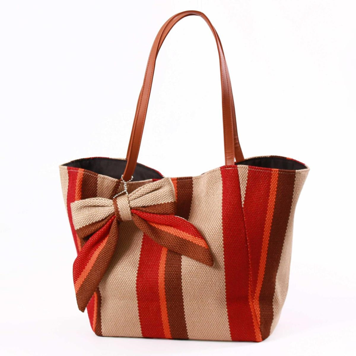 Borsa in tessuto a righe rosse e beige con fiocco e manici in ecopelle
