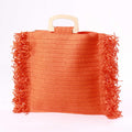 Borsa arancione in cellulosa tessile con frange e manico in legno