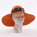 Cappello in paglia naturale arancione con fascia