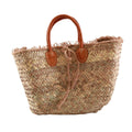 Borsa in paglia naturale sfrangiata con manici in cuoio