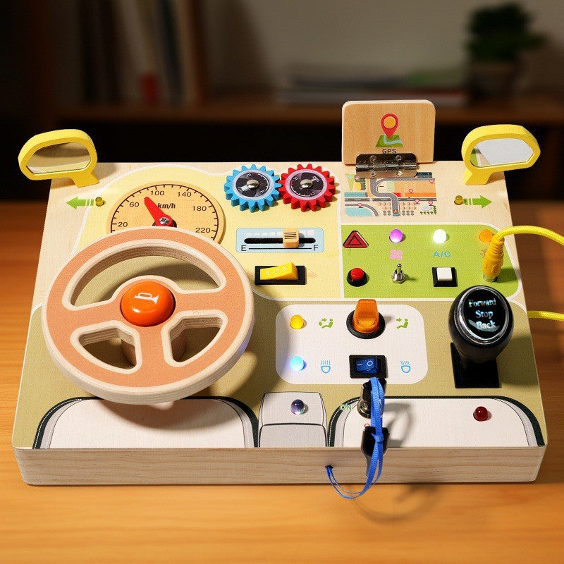 Busy board Montessori con volante, luci e suoni – dettaglio 1