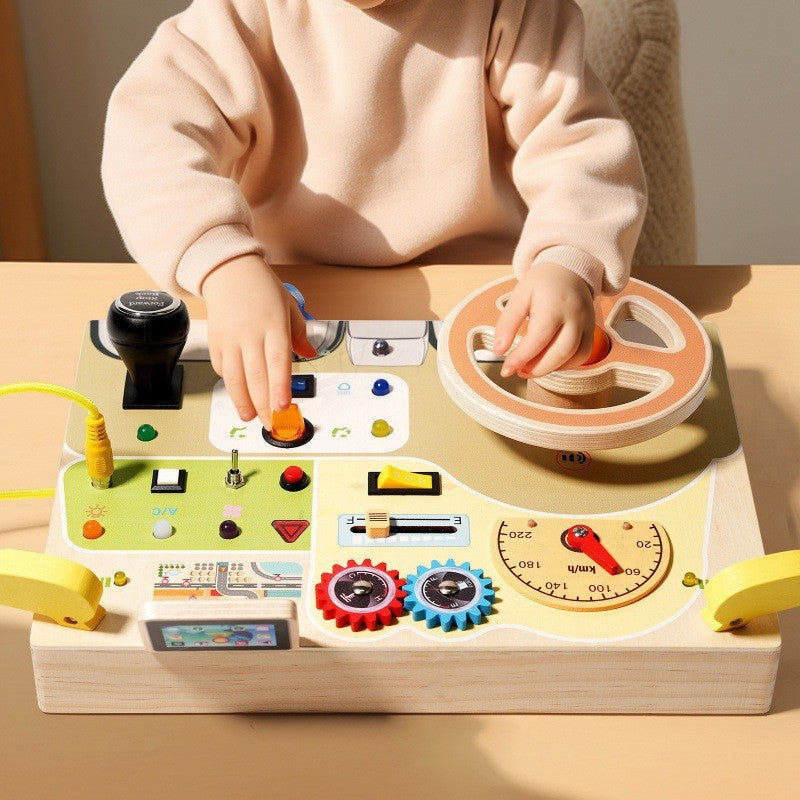 Busy board Montessori con volante, luci e suoni – dettaglio 2