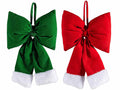 Fiocchi di Natale in velluto colorato con bordo in morbido eco-fur da appendere, set da 12 pezzi, cm 18 x 6 x 28 H