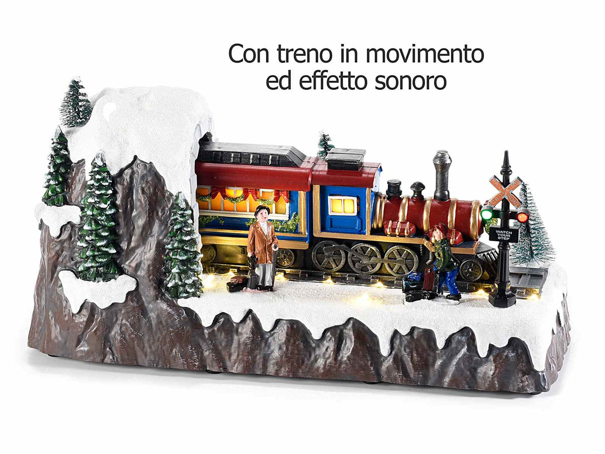 Paesaggio natalizio con treno in movimento, luci LED e musica. Decorazione, cm 32 x 12,5 x 16 H