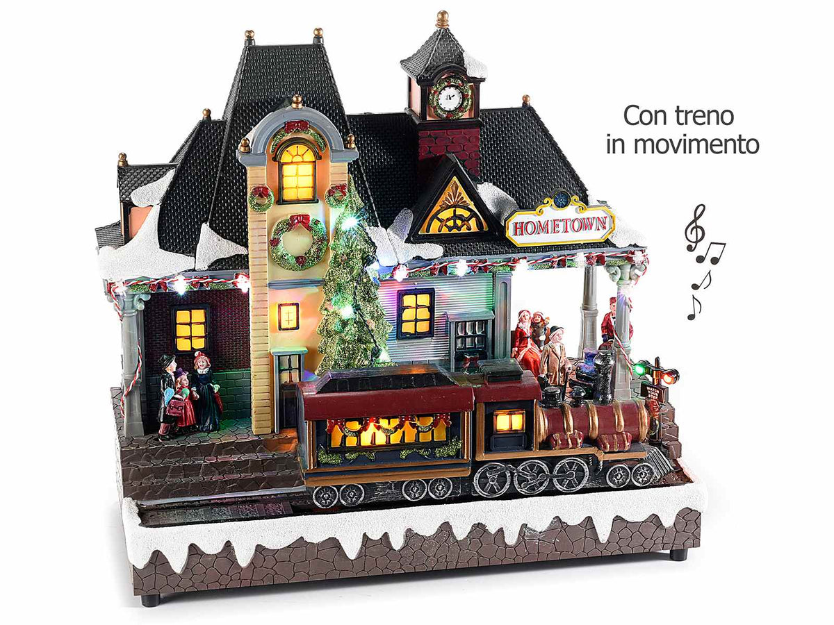 Stazione natalizia in resina con treno in movimento, luci LED e musica, cm 32,5 x 15,5 x 29 H