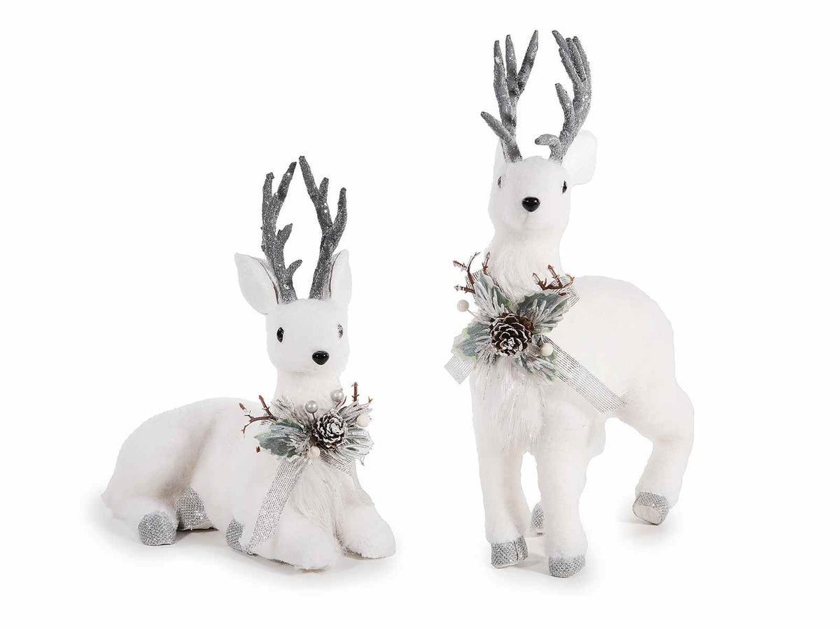 Renne in floccato bianco con decorazione fiocchetto e pigne e decori glitter, In piedi: cm 25x9x35,5 H