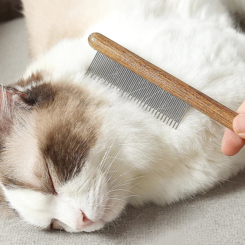 Pettine in acciaio inox con manico in legno per cani e gatti